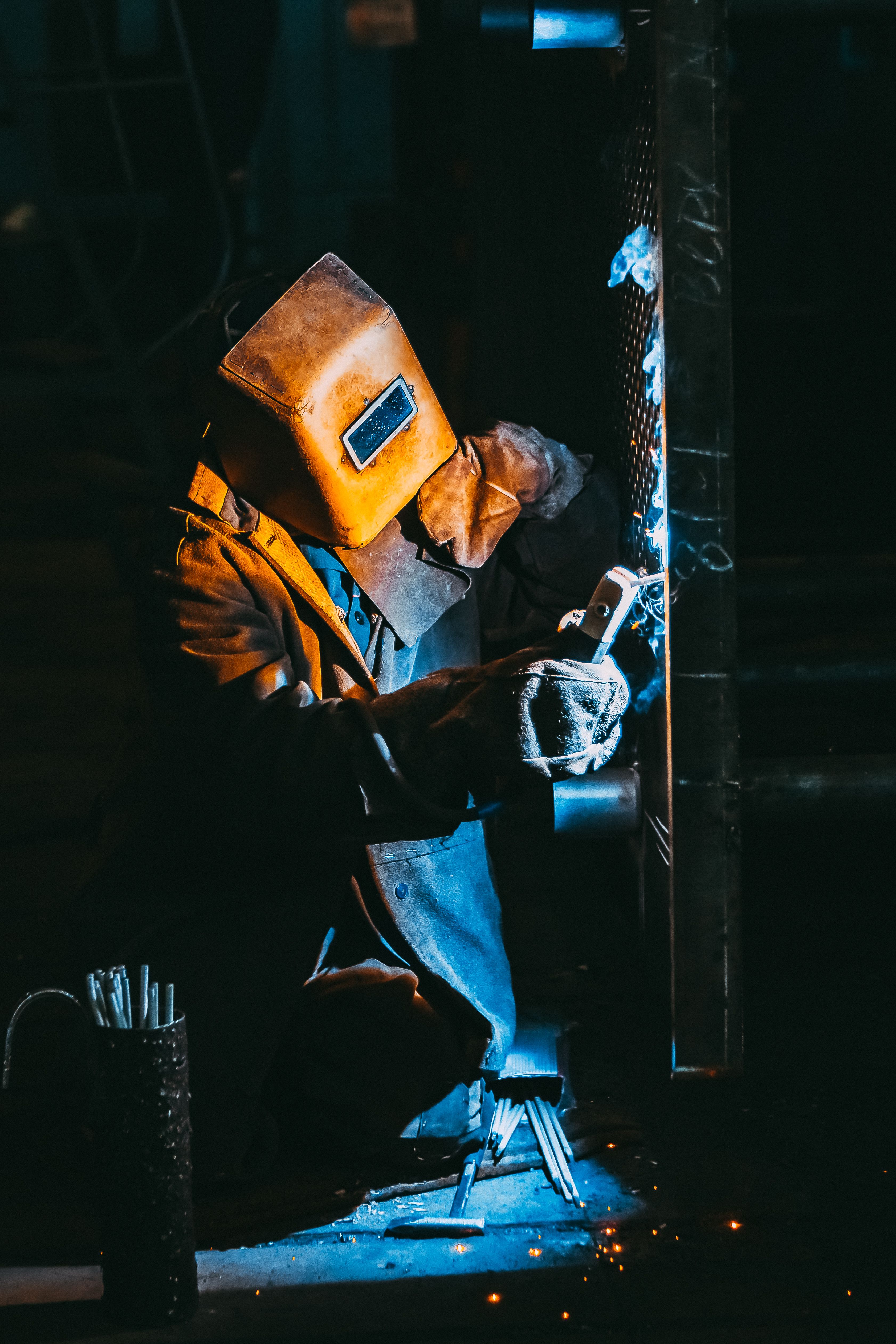 Professional welding work on steel structure